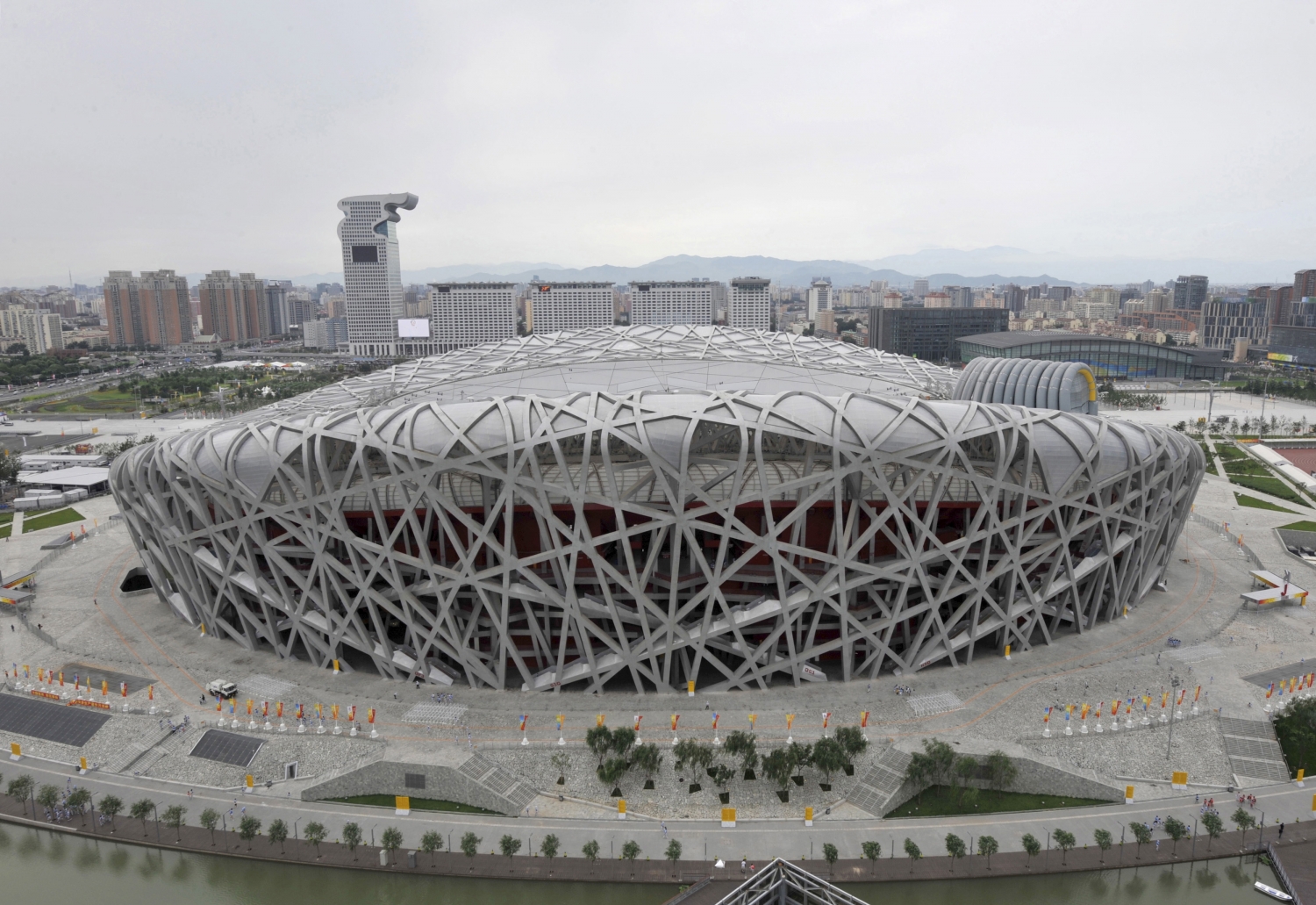 Стадион гнездо. Стадион Птичье гнездо в Пекине. Национальный Олимпийский стадион в Пекине. Стадион «Птичье гнездо» (Пекин, Китай). Олимпийский стадион «Птичье гнездо».